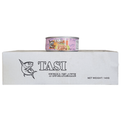 TASI tuna flake can on a white block with TASI branding TASI tuna flake can on a white block with TASI branding