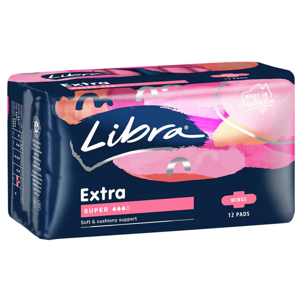 Packaging of Libra Extra Super Wings with 6 x 12's menstrual pads. The package is predominantly pink and purple with product information and branding.