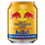 A can of Red Bull Energy Drink with a yellow label, featuring the Red Bull logo and the text 'Kratzng-Daeing 250' in Thai.